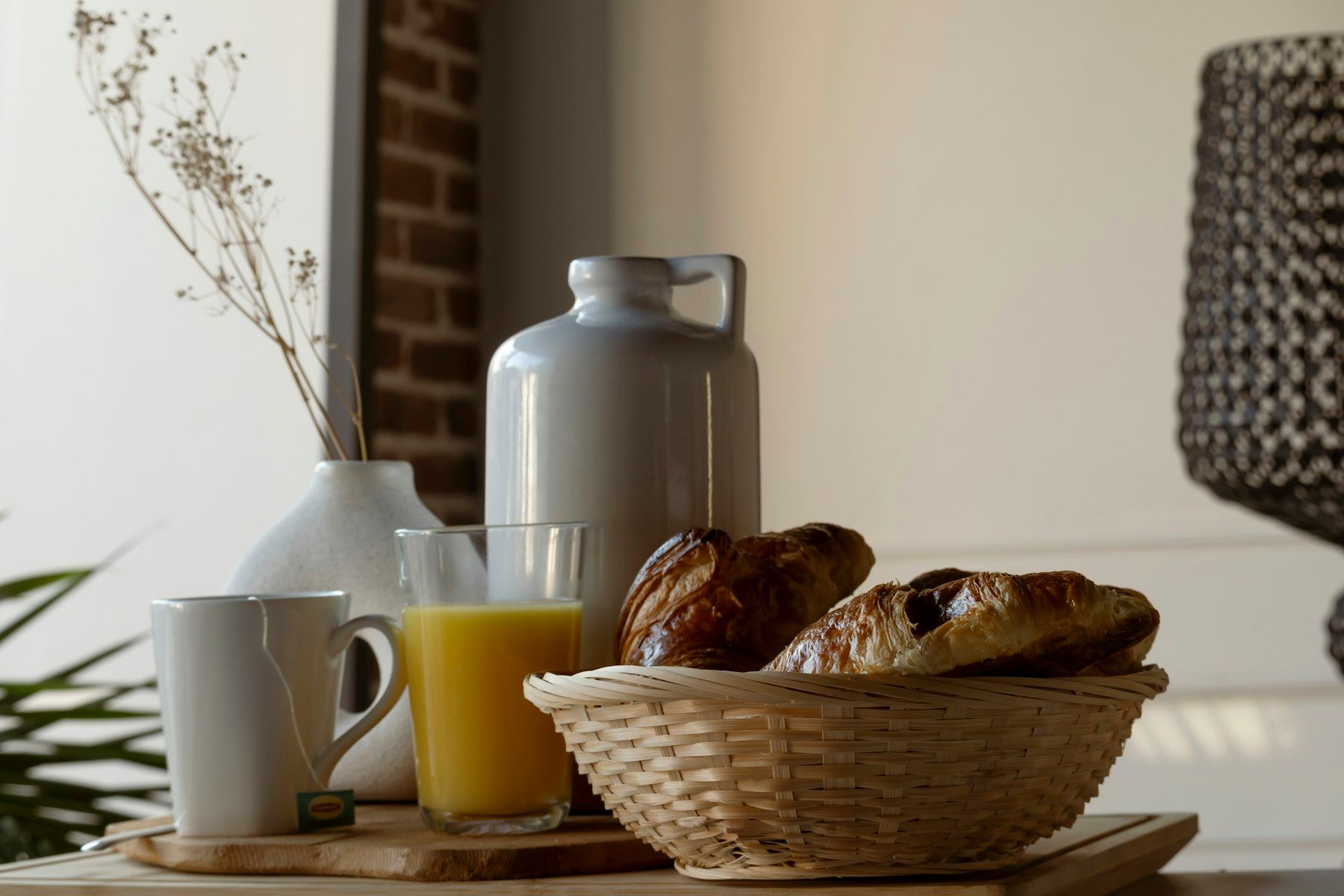 A welcome breakfast of pastries, juice and coffee on a table